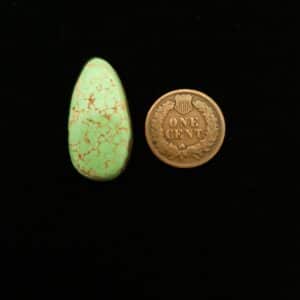 "14.85-Carat Minty Green Turquoise Cabochon with Spider Web Brown Matrix from Grasshopper Mine on TurquoiseDeluxe."