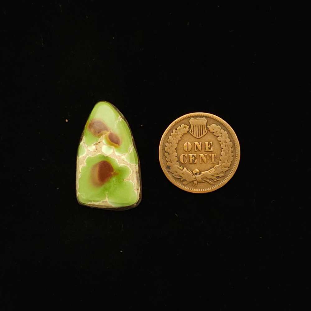 "Very Unusual Pear-Shaped Green Turquoise Cabochon with Three Distinct Red Iron Stain Eyes and Creamy Matrix from Grasshopper Mine on TurquoiseDeluxe."