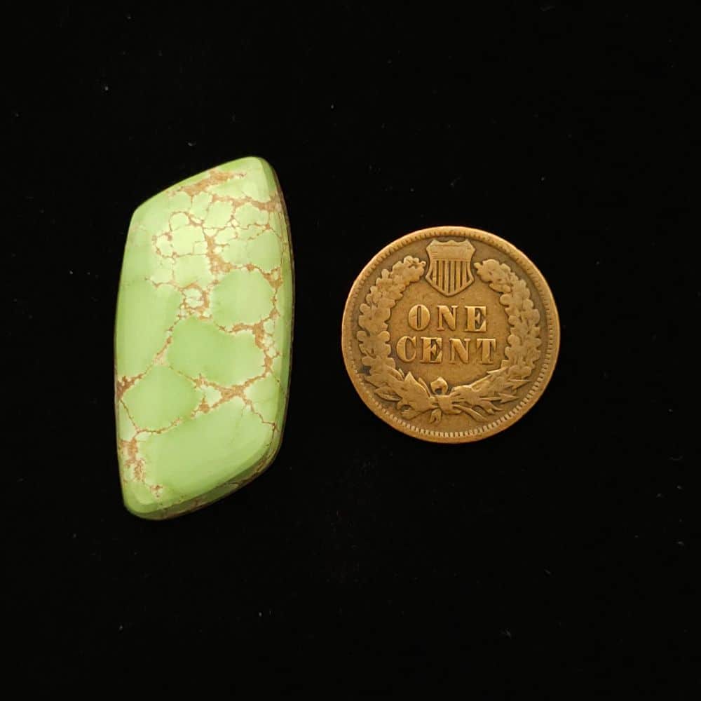 "Light Green Rhombus-Shaped Turquoise Cabochon with Cool Chocolate Webbing, 24.90 Carats, 31.31mm x 15.47mm from Grasshopper Mine on TurquoiseDeluxe."