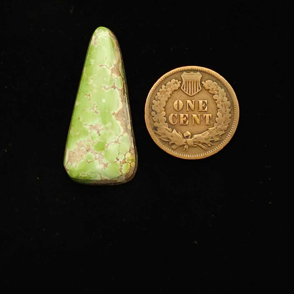 "Long Narrow Triangular Lime Green Turquoise Cabochon with Rounded Edges and Light Brown Matrix, 18.70 Carats, 31.95mm x 14.80mm, from Grasshopper Mine on TurquoiseDeluxe."