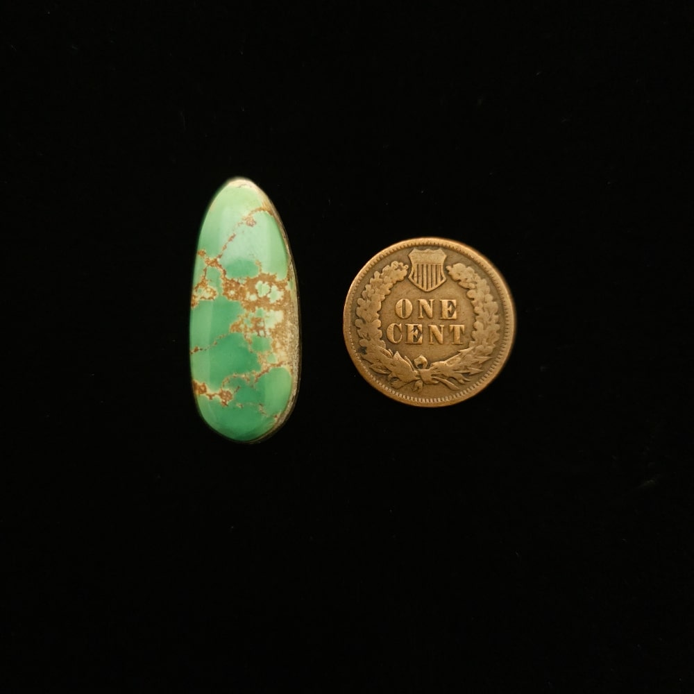 "Teal Green Turquoise Oval Cabochon with Gold and Brown Matrix from Grasshopper Mine on TurquoiseDeluxe."