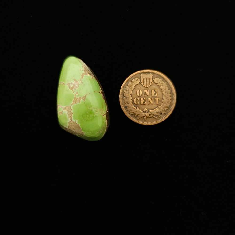 "Apple Green Turquoise Cabochon with Gold Matrix from Grasshopper Mine on TurquoiseDeluxe."