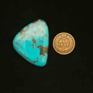 "Bright Blue Triangle Nacozari Mine Turquoise Cabochon with Rounded Points and Chocolate Brown Matrix, 52.40 Carats, 40.46mm x 31.42mm, Stabilized, from Nacozari Mine on Turquoise Deluxe"