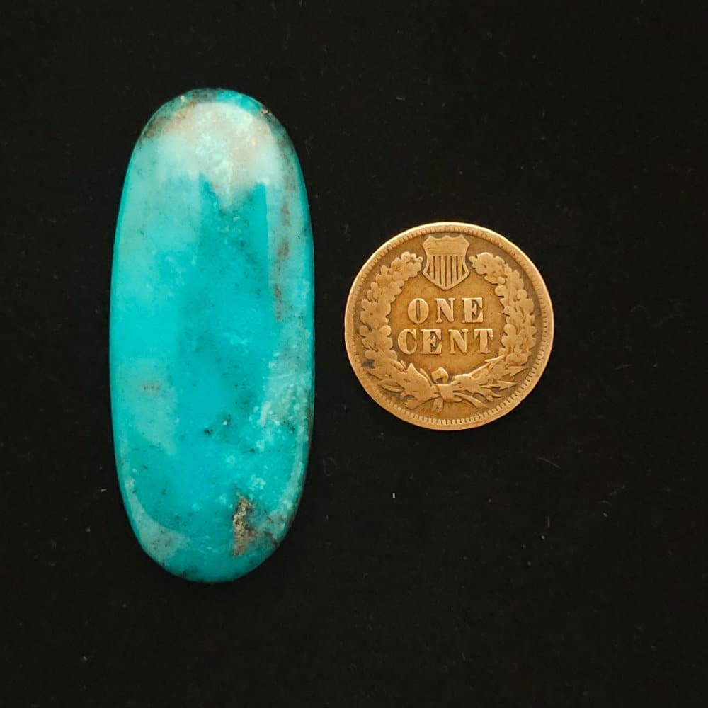 "Azure Blue Oval Nacozari Mine Turquoise Cabochon with Hints of Black Matrix, 36.50 Carats, 45mm x 18.48mm, Stabilized, from Nacozari Mine on Turquoise Deluxe"