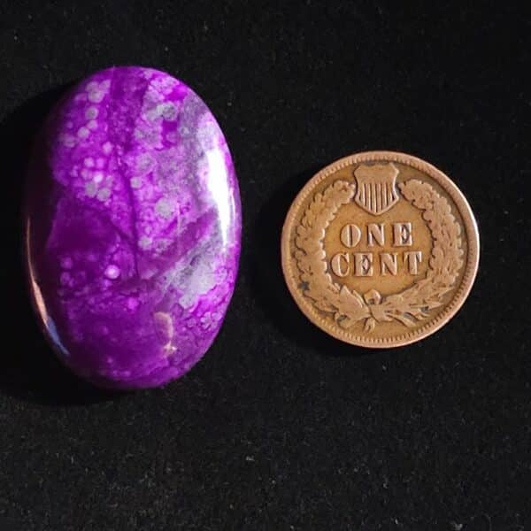 "Deep Purple Oval Sugilite Cabochon with Wisps of Dark Grey Matrix from Wessels Mine, 30.60 Carats, 31.63mm x 21.67mm, Untreated and Natural"