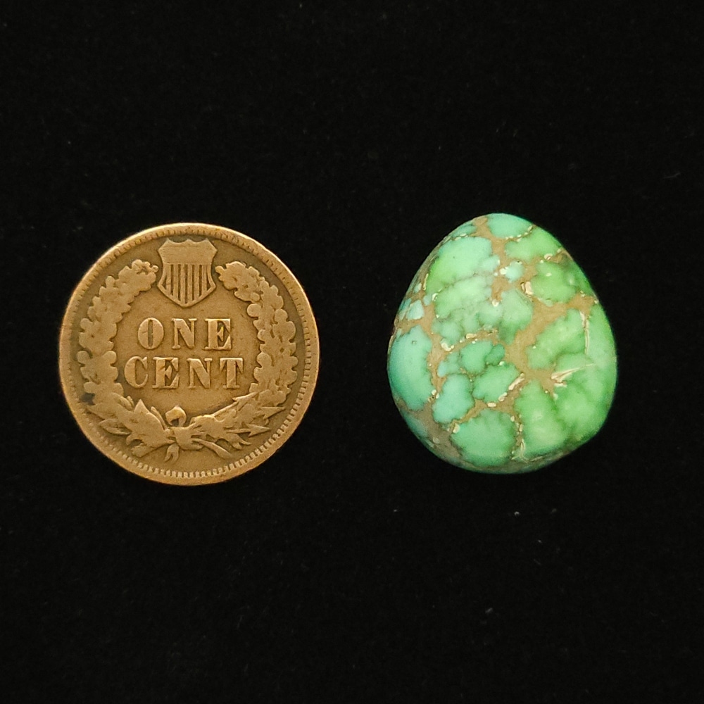 Freeform Carico Lake turquoise cabochon, pastel green with creamy brown matrix, 16.40 carats