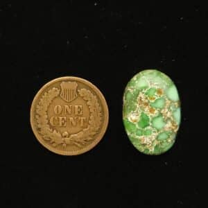 Oval Carico Lake turquoise cabochon, forest green fading to pastel with milk chocolate spiderweb matrix, 11.95 carats