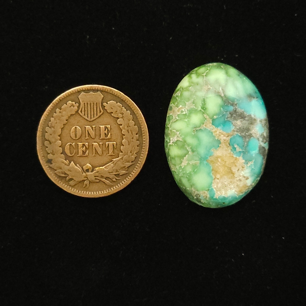 Oval Carico Lake turquoise cabochon, blue fading into pastel green with cream matrix, 17.90 carats