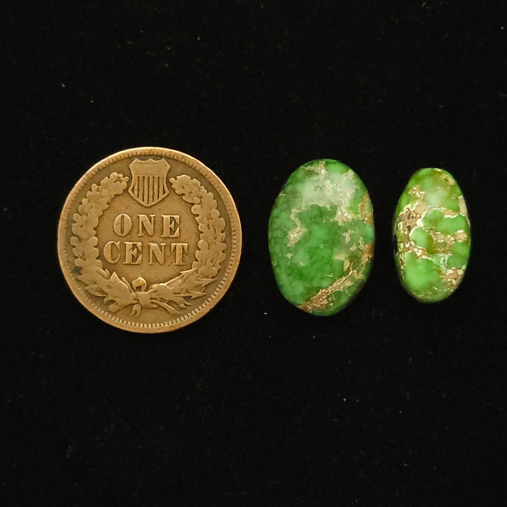 Matched set of Carico Lake turquoise cabochons, emerald green with mocha matrix, 12.55 carats total