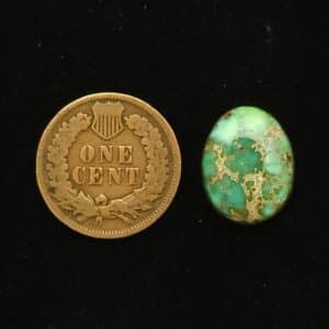 Oval Carico Lake turquoise cabochon, pastel green fading to teal with light coffee spiderweb matrix, 8.45 carats