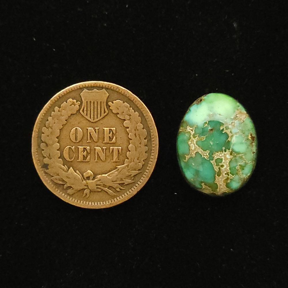 Oval Carico Lake turquoise cabochon, pastel green fading to teal with light coffee spiderweb matrix, 8.45 carats