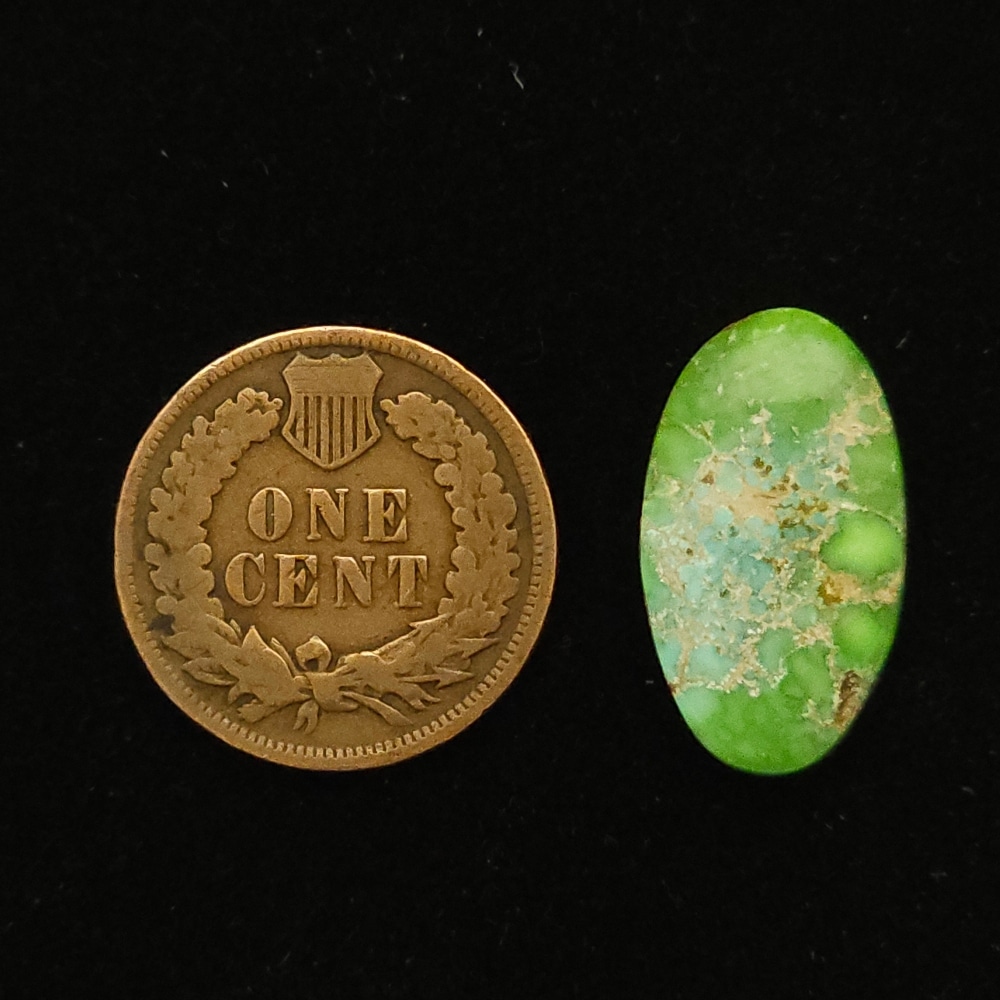 Elongated oval Carico Lake turquoise cabochon, blue fading into chartreuse green with cream matrix, 7.95 carats