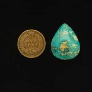 Teardrop-shaped Godber-Burnham turquoise cabochon in ocean blue with mocha matrix, 28.45 carats