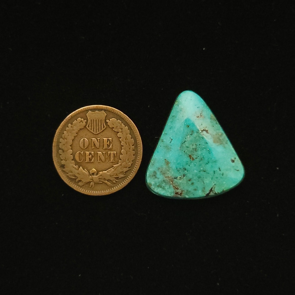 Rounded triangle Godber-Burnham turquoise cabochon in sky blue with ochre matrix, 14.40 carats