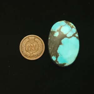 Oval Godber-Burnham turquoise cabochon in sky blue with lightning bolt black matrix, 51.70 carats