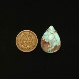 Dry Creek turquoise cabochon, 19.10 carats, teardrop shape, pale blue with purple-brown spiderweb matrix