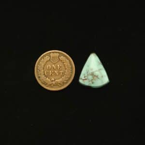Dry Creek turquoise cabochon, 9.20 carats, triangle shape, pastel blue with brown matrix