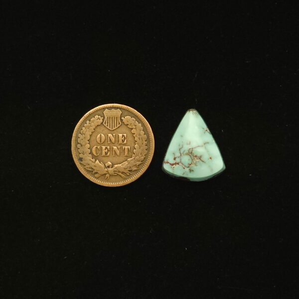 Dry Creek turquoise cabochon, 9.20 carats, triangle shape, pastel blue with brown matrix